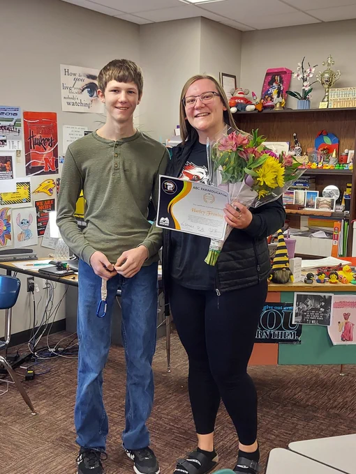 ABC Paraeducator Award nominee with a student.