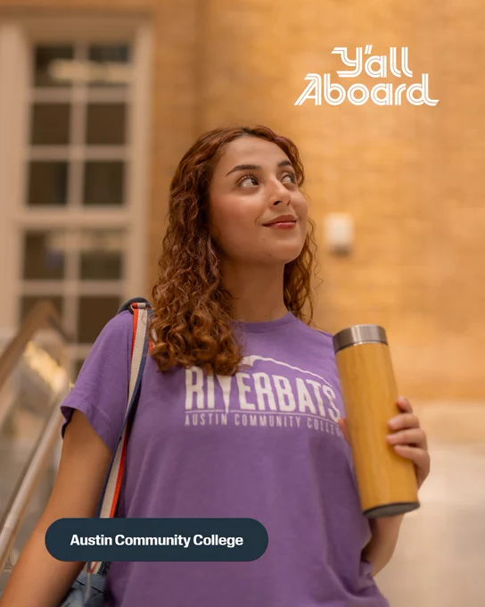 A student wearing a purple Riverbats t-shirt walks down the stairs at ACC Riverside. Text above that reads “Y’all Aboard.”