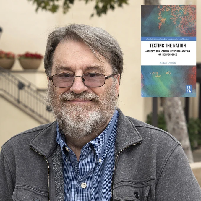 Portrait of Michael Ditmore with the cover of his book