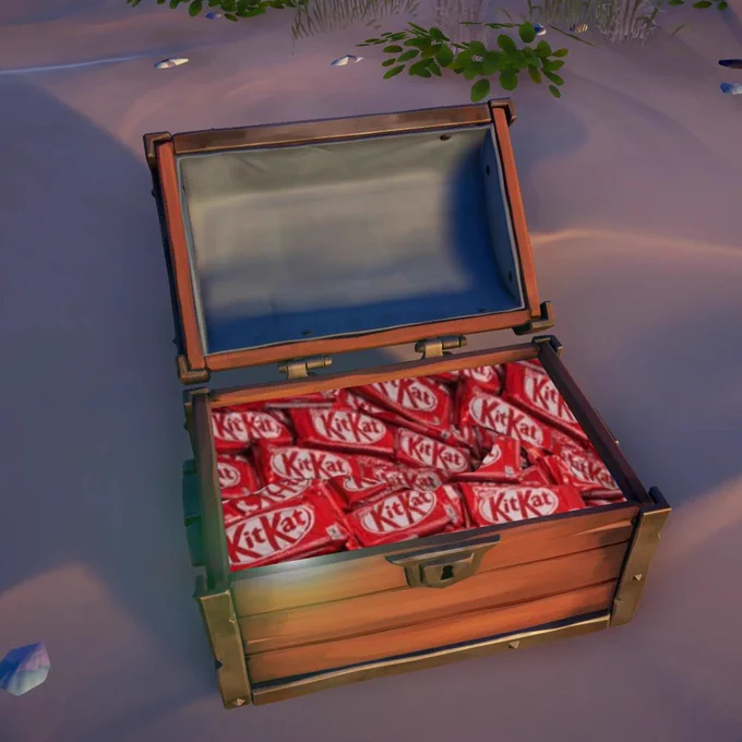 Screenshot of a collectors chest in Sea of Thieves stuffed with thousands of Kit Kat chocolate bars.