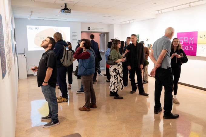 Photo of the opening reception for an art gallery in the CMA Gallery.