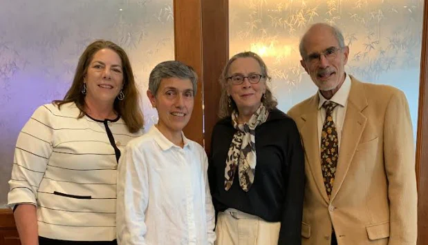 SLMath honors retiring Deputy Director Hélène Barcelo at her Celebration of Service in March 2026. Pictured from left are SLMath Emeriti Trustee Dr. Judy Walker, SLMath Director Dr. Tatiana Toro, SLMath Deputy Director Dr. Hélène Barcelo, and SLMath Emeriti Trustee and former Director David Eisenbud. 