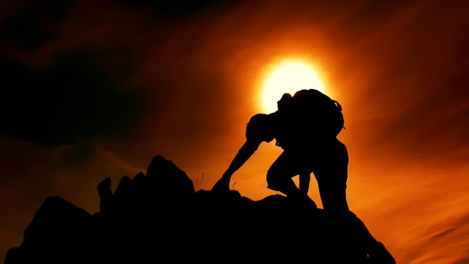 Man climbing to signify AerynOS reaching for it's goals