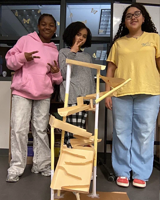 Students with ball run submission