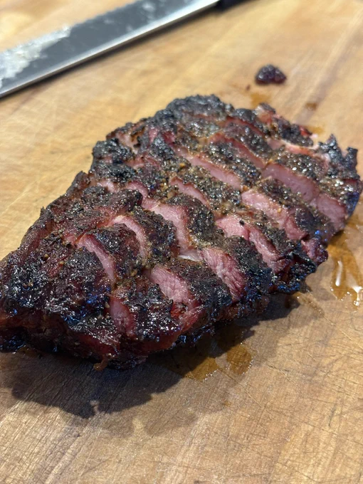 Pork steak, from the pork shoulder usually used for pulled pork, but cut into steak sections and slow smoked until probe tender