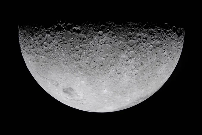 As the Artemis II crew flew over the terminator, the astronauts described this boundary between day and night as "anything but a straight line." Crater rims along the terminator stand out as "islands" in the night. Giant chains of craters emanating from the 3.7-billion-year-old Orientale basin can be seen scouring the surface, stretching almost to the terminator. This tells a geologic story: these crater chains produced by the Orientale impact event mar the surface of the relatively flat Hertzsprung Basin (center of this image), which means that Hertzsprung Basin must be even older than Orientale. Credit: NASA