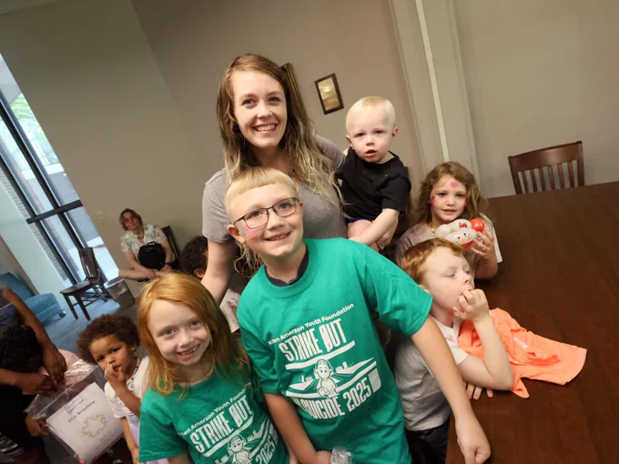 Family enjoying Kinderpalooza event at the Tuscaloosa Public Library