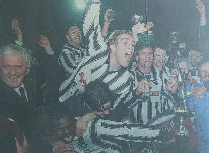 Harwich and Parkeston celebrate winning the Eastern Counties League Cup in 1997.
