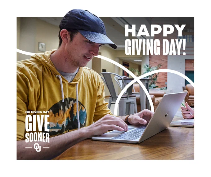 A person in a casual outfit and cap is using a laptop at a table. In the background, another individual is holding a smartphone. The image features the text "Happy Giving Day!" and "OU Giving Day - Give Sooner" alongside the University of Oklahoma logo.