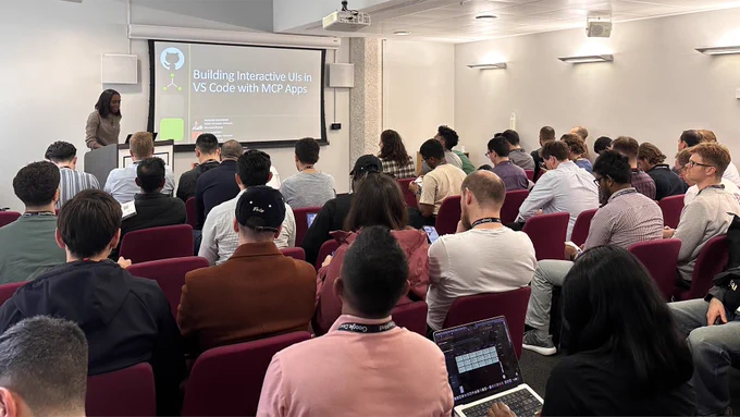 Photograph of staff and attendees at the AI Engineer Europe event in London.