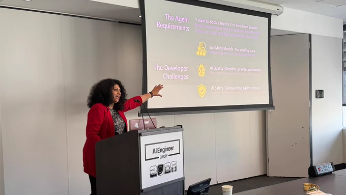 Photograph of a speaker at the AI Engineer Europe event in London.