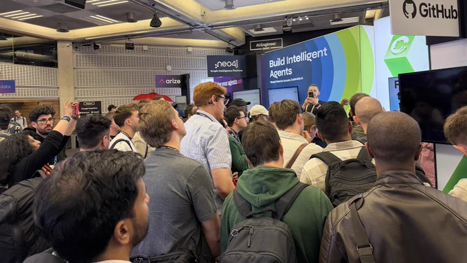 Photograph of staff and attendees at the AI Engineer Europe event in London.