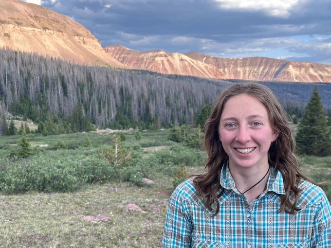Freyja Moser with mountains in the background
