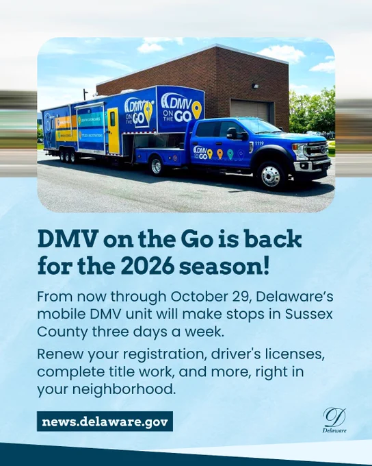 Trailer and truck with DMV on the Go branding parked in a lot on a beautiful sunny day.