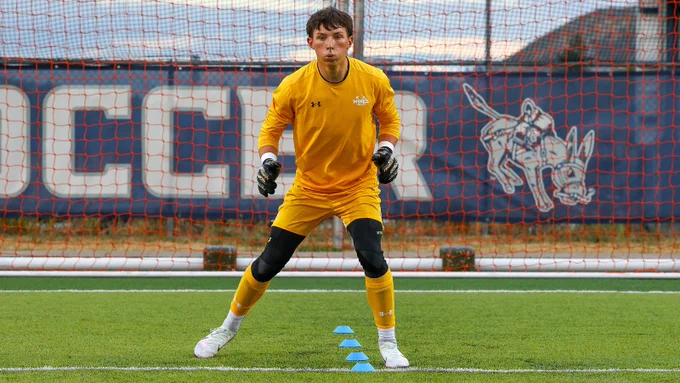 Zach MacDonald warms up before a 2025 friendly match against Harpos FC