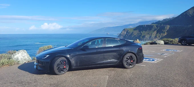 My Girlfriend (Model S) on an overlook in CA Hwy 1.