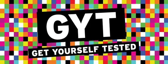 Colorful pixelated background with bold white letters GYT and the phrase Get Yourself Tested below it.