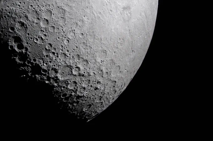 A portion of the Moon\u2019s farside is seen along the terminator\u2014the boundary between lunar day and night\u2014where low-angle sunlight casts long shadows across the surface. A section of Orientale Basin is visible along the upper right portion of the lunar disk, its structure subtly revealed under grazing illumination. This lighting enhances contrast across the cratered terrain, highlighting variations in surface features and providing insight into the Moon\u2019s geologic history. Credit: NASA
