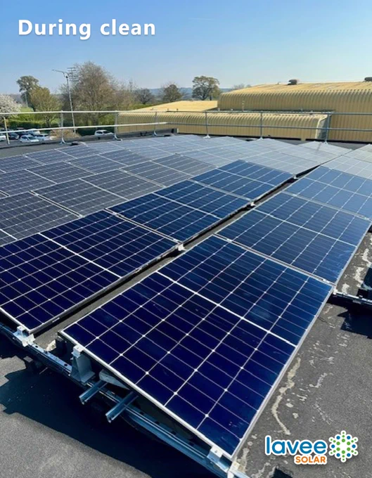 Rooftop solar array during cleaning, showing clear contrast between cleaned and uncleaned panel sections on the same site.