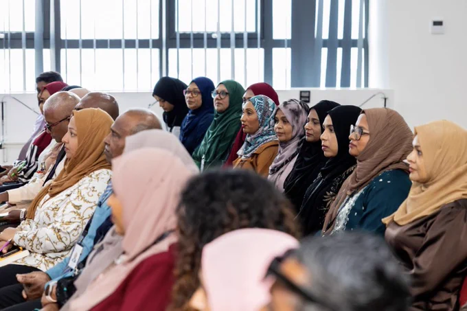 Picture of many staff members sitting