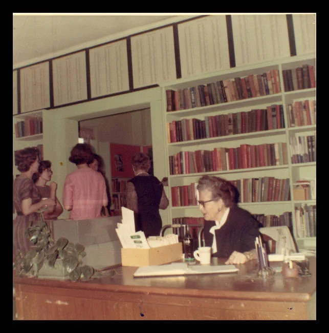 From Mississippi Library Commission's Mississippi Library Photos Collection. A librarian sits at her desk at Kilmichael Public Library.