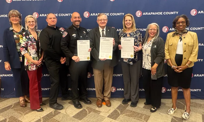 Arapahoe County commissioners, sheriff and 911 Authority with proclamation recognizing National Public Safety Telecommunicators Week 