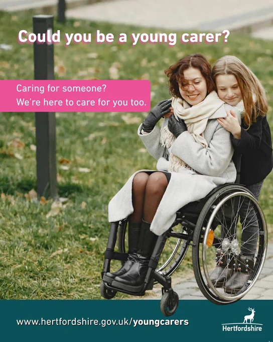 Young carer with a friend in wheelchair