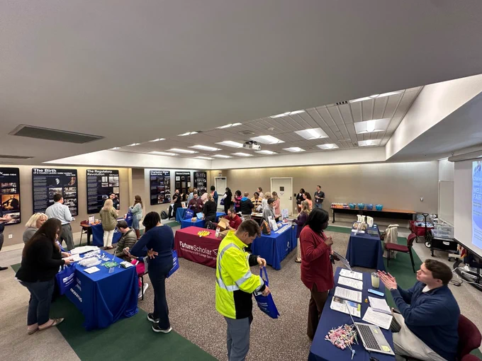 Roomful of wellness fair participants 
