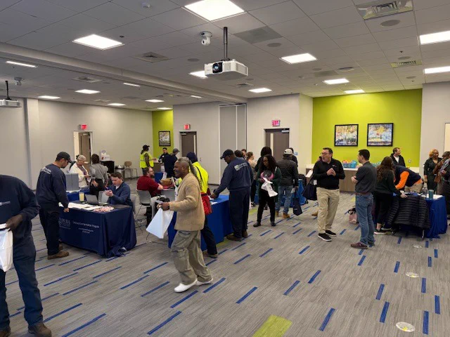 Roomful of wellness fair participants 
