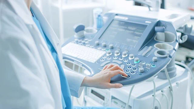 A person is using a medical device.
