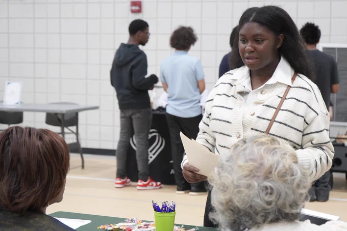 A JEFCOED student speaks to representatives of a company during JEFCOED’s Industry Connection Day.