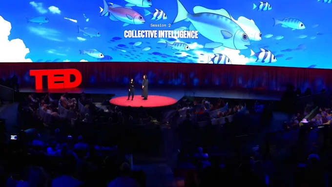 Audrey Tang (right), Taiwan’s cyber ambassador, first digital minister, architect of the Taiwan Model for digital diplomacy and 2025 Right Livelihood laureate, takes centre stage with Divya Siddarth (left), social technologist and political economist, during Session 2: Collective Intelligence at TED2026 in Vancouver, Canada.