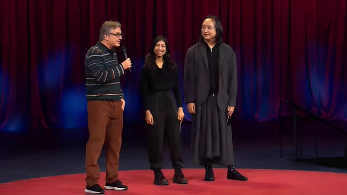 Audrey Tang (right), Taiwan’s cyber ambassador, first digital minister, architect of the Taiwan Model for digital diplomacy and 2025 Right Livelihood laureate, is joined by Divya Siddarth (centre), social technologist and political economist, as Chris Anderson (left), chairman of TED, opens Session 2: Collective Intelligence at TED2026 in Vancouver, Canada.