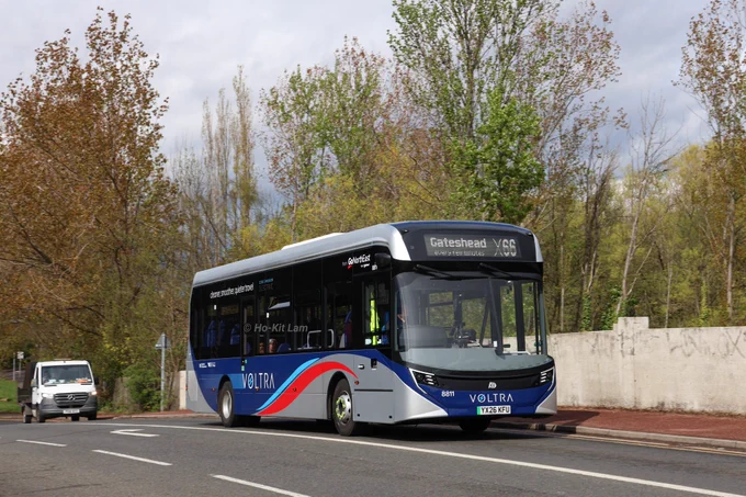 Go North East 8811 (YX26KFU) is a silver based with blue and red swoops, Alexander Dennis Enviro200EV and is pictured crossing the River Teams in Teams as it headed to Gateshead on route X66. 