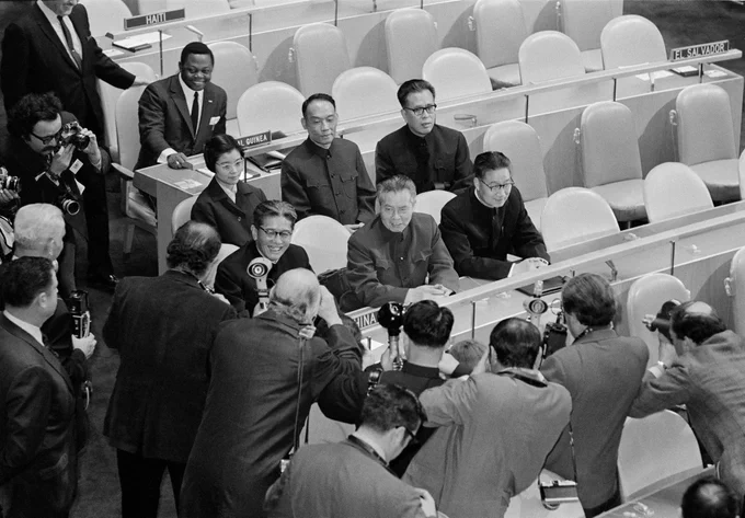 The delegation of the People's Republic of China was formally seated in the United Nations General Assembly on Nov. 15, 1971. 

In the front row from left to right are: Chiao Kuan-hua, Chairman of the delegation; Huang Hua, Vice Chairman and Permanent Representative to the UN; and Fu Hao, Representative. In the second row from left to right are: Tang Weng Sheng, Interpreter; Hsiung Hsiang-hui, Representative; and Chen Chu, Representative.