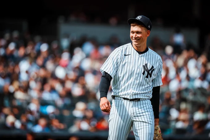 Will Warren smiles as he pitches.