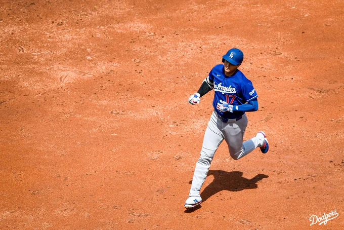 A photo of Shohei Ohtani rounding the bases after hitting a home run.