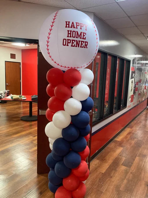 Angels Home Opener baseball with red white and blue balloons at the KLAA studios.