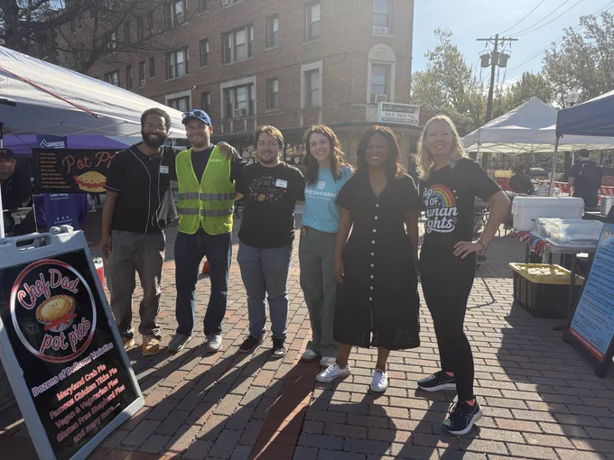 Pictures of Councilmember Lewis George speaking with neighbors and celebrating the opening of the FRESHFARM Uptown Market on 13th and Kennedy St NW.