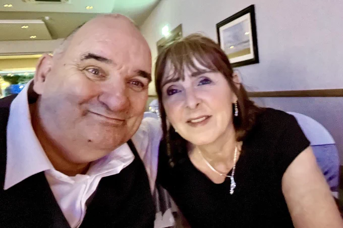 Ian & Denise enjoy a selfie moment on their anniversary
