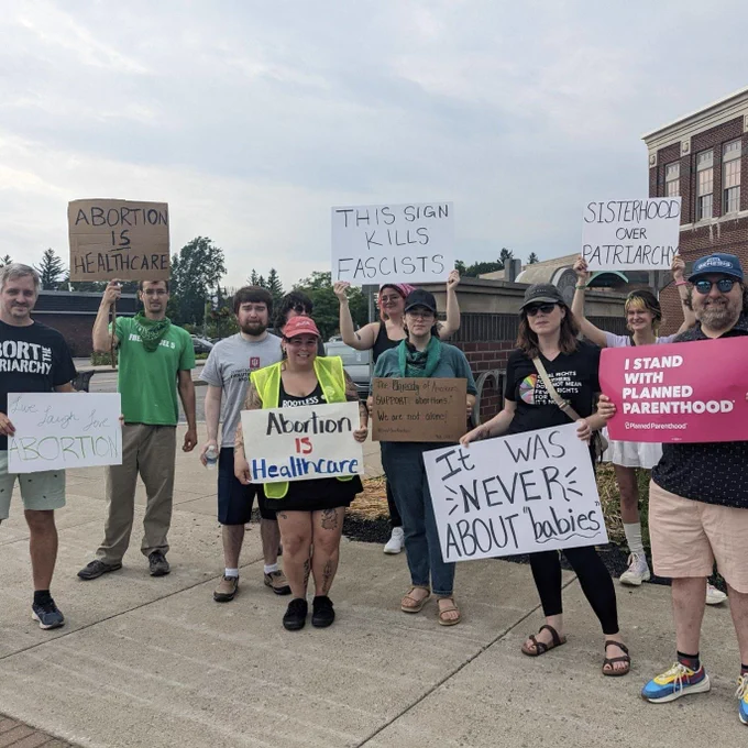 Comrades rallying on behalf of bodily autonomy.