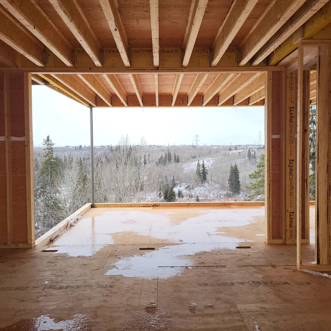 :: lookout | #thirdstone_inc 

Designed to frame & heighten the experience of views overlooking Whitemud Creek. The lookout house acts as a "mediator" between its occupants & the vast territory it overlooks. 

This view from the Primary Bedroom with access to a floating terrace that cantilevers over a sloping site rising above  the forest canopy. 

The lookout house is at framing stage and  is scheduled for completion in 2026. 

Design :: thirdstone inc.
Builder :: Birkholz 