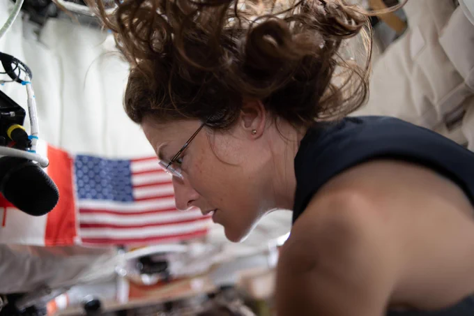 NASA astronaut and Artemis II mission specialist Christina Koch, seen here on the fourth day of the mission, prepping for lunar flyby activities after completing aerobic exercise on the flywheel device. Credit: NASA