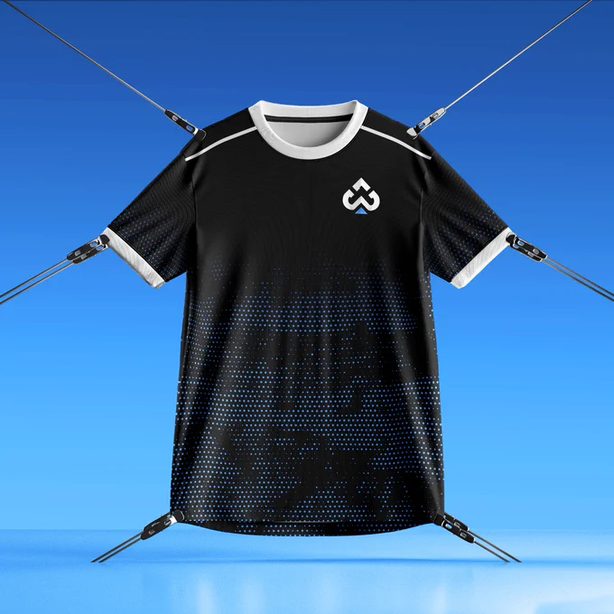 A professional 3D mockup of a black eSports jersey with blue halftone dot patterns on the lower half and sleeves. The jersey features a white collar and shoulder stripes, displayed on a cinematic dark background with matching blue dot textures.