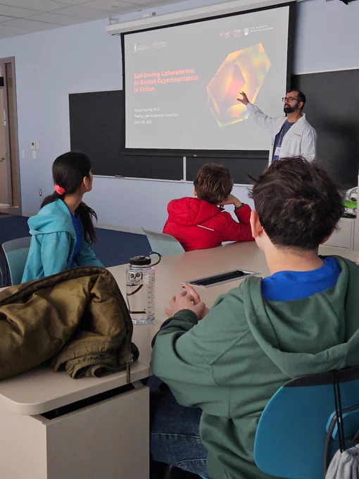 Gurpaul Kochhar, AC training lead, presents to a group of students at the 2026 Toronto Science Fair.