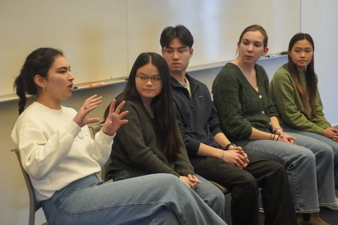 Five MIT student panelists during a Q&A session.
