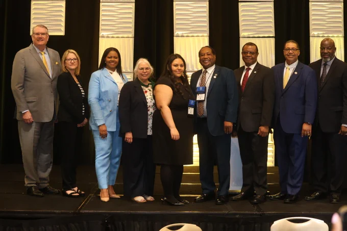 A group photo of speakers