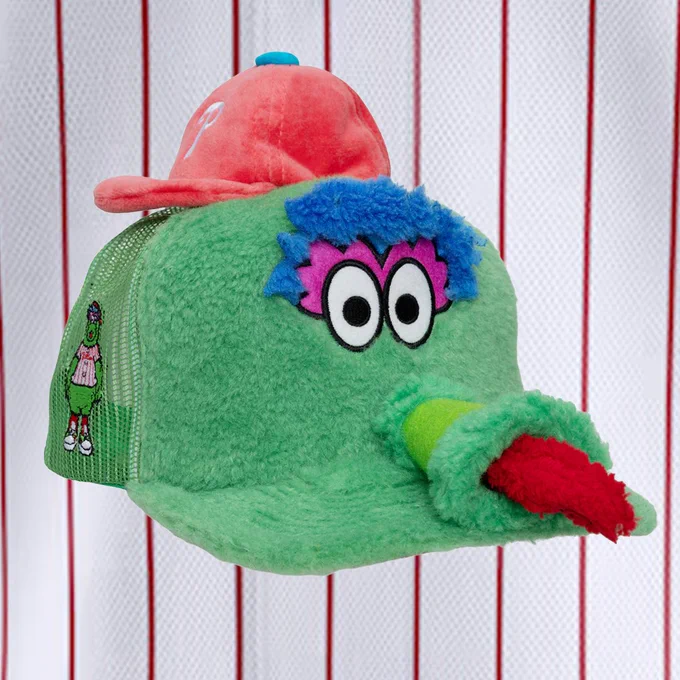 A Phillie Phanatic trucker hat with green, blue and red fur. This hat features the iconic Phillie Phanatic beak with his tongue sticking out and a smaller red Phillies hat on top.