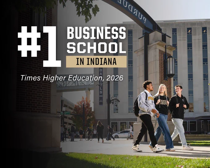 A group of students walking in front of a Purdue University archway. The text on the image reads, "#1 Business School in Indiana" with a citation to Times Higher Education, 2026.