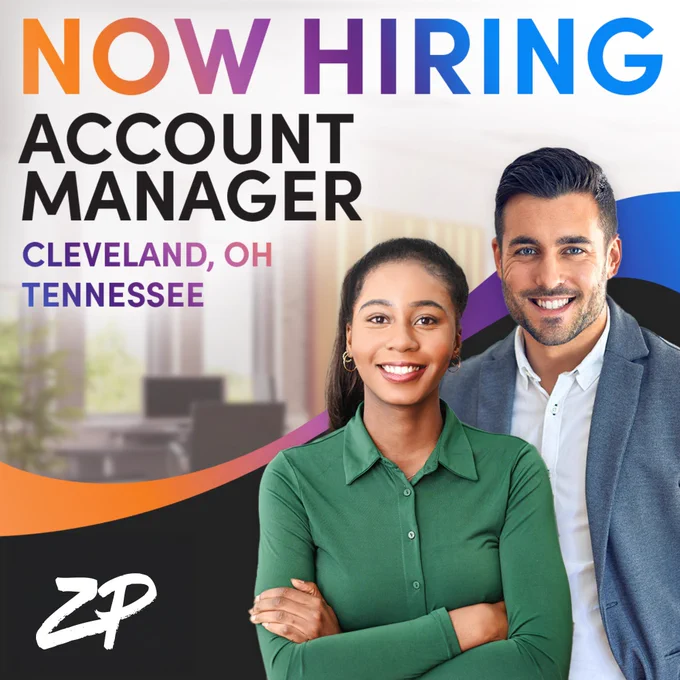 At the top of the graphic is the text "Now Hiring". Below it is the text "Account Managers Tennessee   Cleveland, OH" In the background is an image of a desk in an office. To the right is an image of a man and woman, both wearing business casual clothing, smiling. At the bottom left, over a black background, is the ZP in white.
